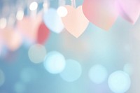  Bokeh hearts backgrounds light blue. AI generated Image by rawpixel.