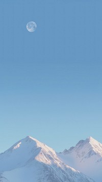 Aesthetic snow covered mountains and one moon and large blue sky landscape wallpaper astronomy outdoors nature.