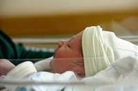 A newborn at the maternity ward portrait hospital photo.