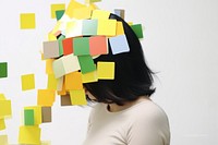 Adhesive notes covering face of exhausted woman paper adult toy. AI generated Image by rawpixel.