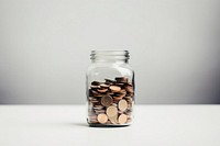 Coin in the jar investment copy space container. AI generated Image by rawpixel.