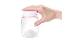 Close up older retired woman taking medicine capsules out of glass bottle jar white background container. AI generated Image by rawpixel.