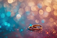 Wedding pattern bokeh effect background ring jewelry gold.