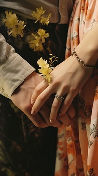  Couple hands bracelet jewelry finger. AI generated Image by rawpixel.