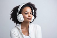 African American woman headphones listening portrait.