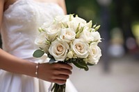 Hand holding wedding bouquet rose fashion flower. AI generated Image by rawpixel.