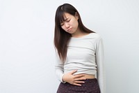 Girl with stomach pain photography portrait adult. AI generated Image by rawpixel.