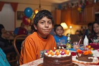 Hispanic teenager boy party birthday dessert.