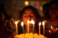 Hispanic teenager girl candle party cake.