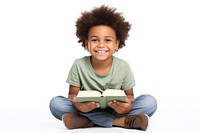 African American happy kid with book on his lap sitting publication reading. AI generated Image by rawpixel.