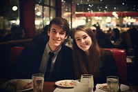 A teen couple dinner in a newyork restaurant architecture portrait adult.