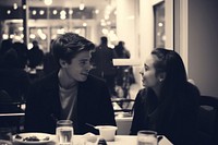 A teen couple dinner in a newyork restaurant portrait adult cup.