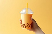 Hand holding bubble tea drink cup refreshment. AI generated Image by rawpixel.