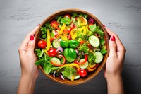Woman hand cooking salad food bowl vegetable. AI generated Image by rawpixel.
