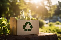 Box with recycle icon outdoors bottle green.