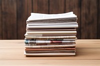 Stack of Newspapers publication newspaper document.