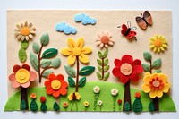 Photo of garden scene art embroidery textile.