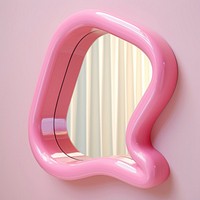 Pink squiggle mirror for wall electronics reflection hardware.