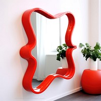 Red squiggle mirror for wall architecture toothbrush pottery.