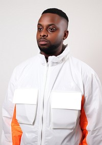 Black man wearing white engineer fluorescent jacket uniform portrait adult photo.