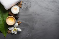 Spa essentials and towel candle spirituality frangipani. AI generated Image by rawpixel.