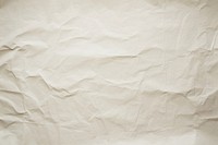 An old white paper backgrounds wrinkled parchment. AI generated Image by rawpixel.