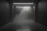 Black studio with fog lighting architecture illuminated.