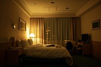 Hotel room furniture lighting bedroom.