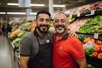 Happy Mexican gay couple buyer in supermarket shopping adult men.