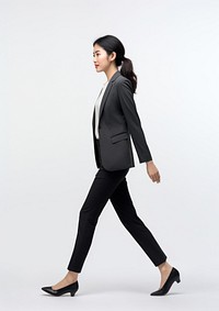 A chinese businesswoman walking blazer person. AI generated Image by rawpixel.