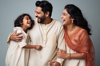 South asian cheerful laughing parent. AI generated Image by rawpixel.