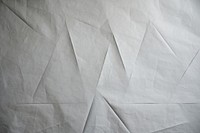 Folded grey paper texture paper backgrounds crumpled textured.