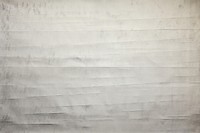 Folded grey paper texture paper backgrounds white scratched.