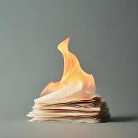 Photography of a Small Burning stack of paper fire burning flame.