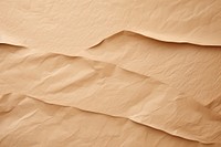  Light brown paper crumped texture backgrounds furniture crumpled. AI generated Image by rawpixel.
