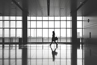 Silhouette Black and white isolate business woman walking flooring airport motion.
