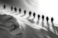 Sillhouette Black and white people hiking amoung snow winter nature black.
