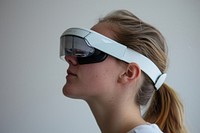 Woman wearing VR glasses futuristic sunglasses accessories technology.