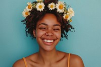 Young african american woman flower laughing portrait.