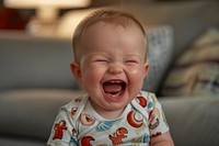 Baby laughing frustration relaxation innocence.