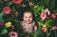 Happy baby in the garden photography portrait flower.