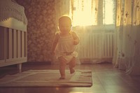 Happy baby walking in the room architecture innocence babyhood.