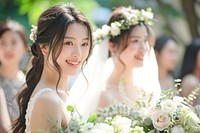 2 Taiwanese women getting married wedding bridesmaid outdoors.