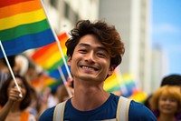 Japanese man smiling parade pride.