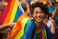 Japanese man parade smiling pride.