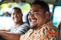 Samoan friends laughing portrait driving.