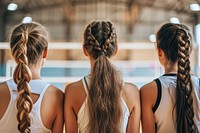 Young volleyball team ponytail braid back.