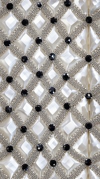 Argyle pattern jewelry white backgrounds.