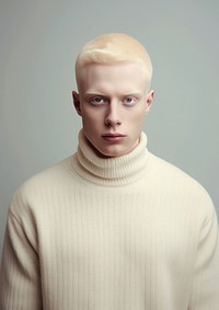 A happy albino man wear cream sweater portrait fashion adult.