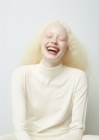 A happy albino woman wear cream casual suit laughing fashion adult.